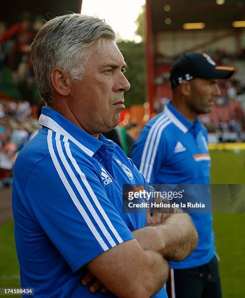 Real Madrid's coach Carlo Ancelotti and assistant Zinedine Zidane look on as his team play during the pre-season friendly football match between...