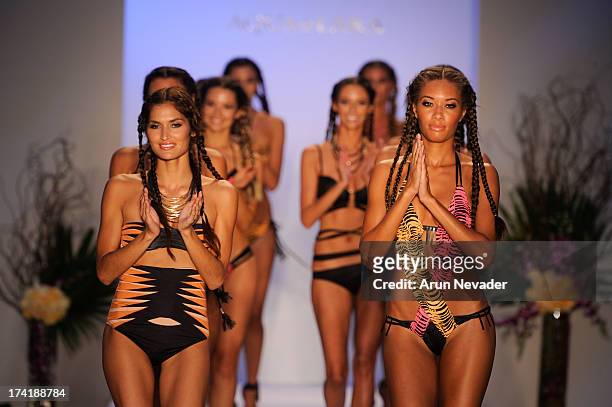 Models walk the runway during the finale at the Aqua Di Lara fashion show At Mercedes-Benz Fashion Week Swim 2014 at Raleigh Hotel on July 20, 2013...