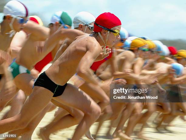 competitors in action at the start - speedo boy stock pictures, royalty-free photos & images