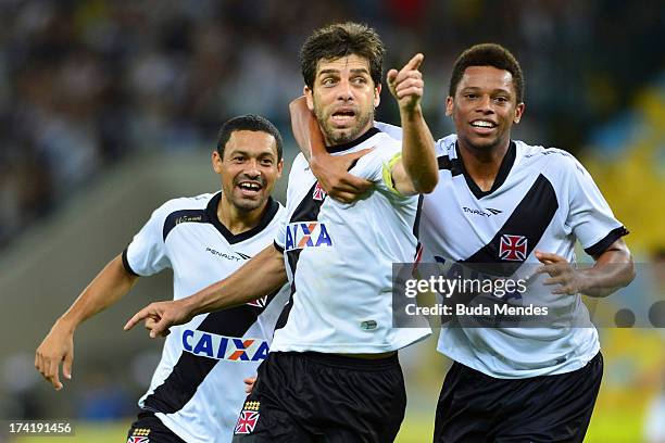 Juninho and his teammates of Vasco celebrate a goal against Fluminense during a match between Fluminense and Vasco as part of Brazilian Championship...