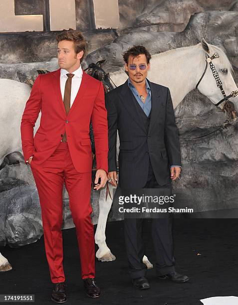 Armie Hammer and Jonny Depp attend the UK premiere of "The Lone Ranger" at Odeon Leicester Square on July 21, 2013 in London, England.