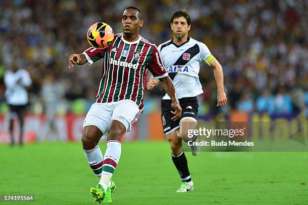 Digao of Fluminense struggles for the ball during a match between Fluminense and Vasco as part of Brazilian Championship 2013 at Maracana Stadium on...