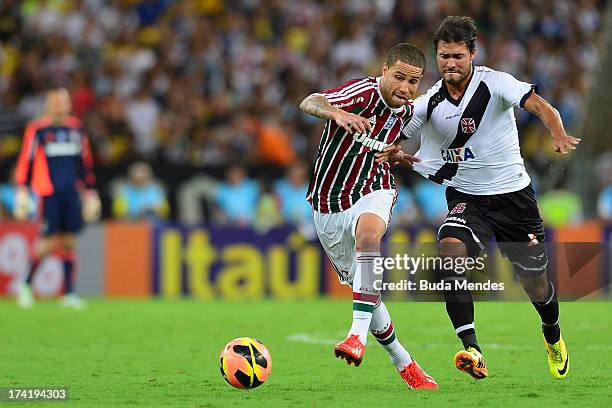 Bruno of Fluminense struggles for the ball during a match between Fluminense and Vasco as part of Brazilian Championship 2013 at Maracana Stadium on...