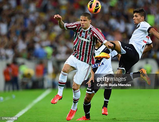 Bruno of Fluminense struggles for the ball during a match between Fluminense and Vasco as part of Brazilian Championship 2013 at Maracana Stadium on...