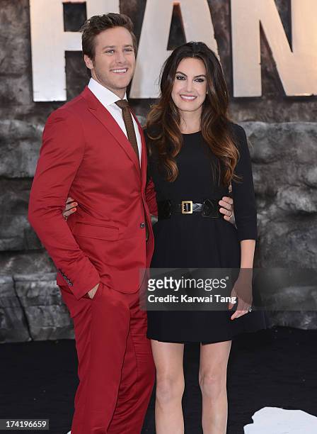 Armie Hammer and Elizabeth Chambers attends the UK Premiere of 'The Lone Ranger' at Odeon Leicester Square on July 21, 2013 in London, England.