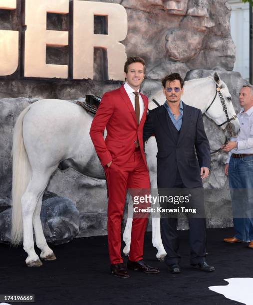 Armie Hammer and Johnny Depp attend the UK Premiere of 'The Lone Ranger' at Odeon Leicester Square on July 21, 2013 in London, England.