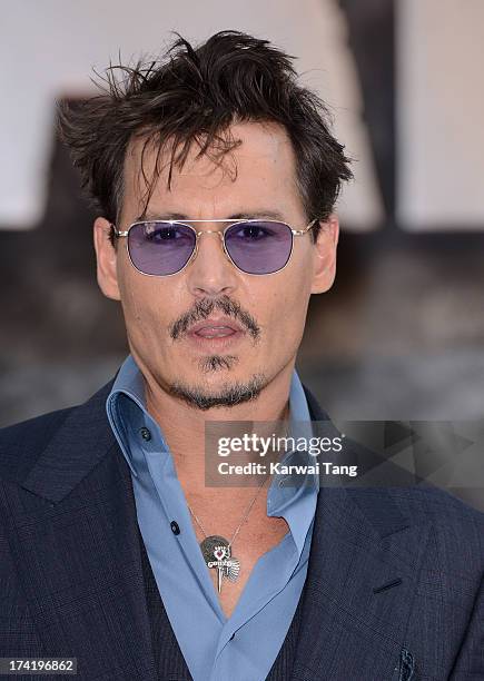 Johnny Depp attends the UK Premiere of 'The Lone Ranger' at Odeon Leicester Square on July 21, 2013 in London, England.