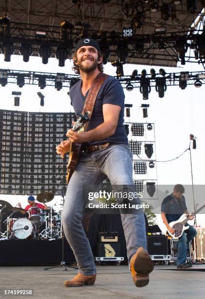 Thomas Rhett performs during the 2013 Faster Horses Festival on July 21, 2013 in Brooklyn, Michigan.