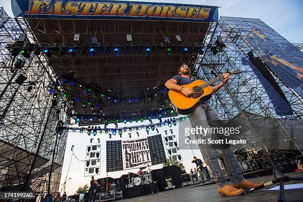 Thomas Rhett performs during the 2013 Faster Horses Festival on July 21, 2013 in Brooklyn, Michigan.