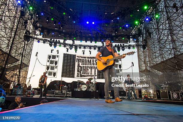 Thomas Rhett performs during the 2013 Faster Horses Festival on July 21, 2013 in Brooklyn, Michigan.