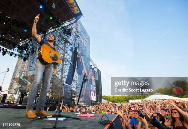 Thomas Rhett performs during the 2013 Faster Horses Festival on July 21, 2013 in Brooklyn, Michigan.