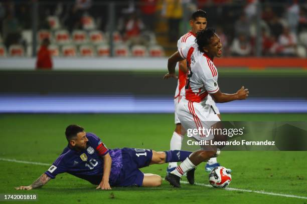 Lionel Messi of Argentina competes for the ball with Renato Tapia of Peru during a FIFA World Cup 2026 Qualifier match between Peru and Argentina at...