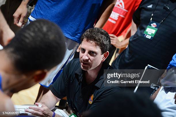 Head Coach of the Golden State Warriors Darren Erman gathers his team during NBA Summer League game between the Charlotte Bobcats and the Golden...
