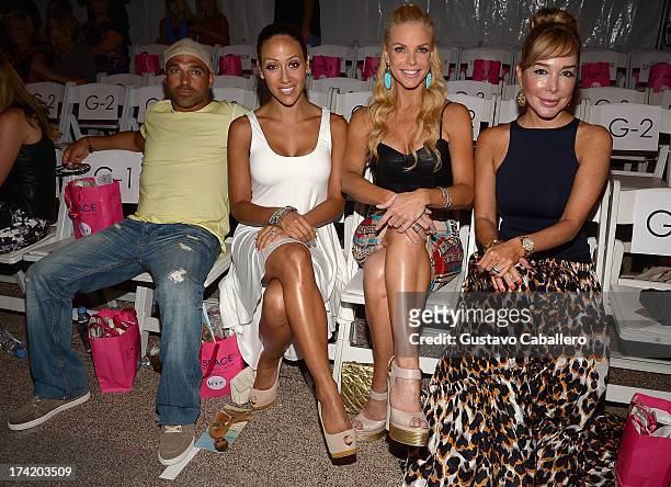 Joe Gorga, Melissa Gorga, Alexia Echevarria and Marysol Patton pose with Ipanema at the L*SPACE By Monica Wise show during Mercedes-Benz Fashion Week...