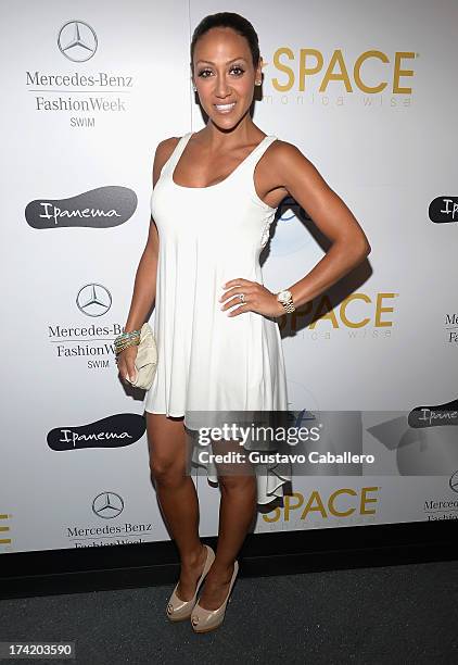 Personality Melissa Gorga poses backstage with Ipanema at the L*SPACE By Monica Wise show during Mercedes-Benz Fashion Week Swim 2014 at Cabana...