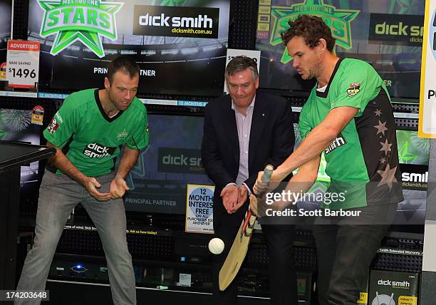 Rob Quiney and Clint McKay along with President of the Stars Eddie Mcguire play a game of cricket during a Melbourne Stars Big Bash League media...