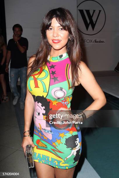 Personality Kourtney Kardashian attends the Wildfox Swim Cruise 2014 show at Soho Beach House on July 21, 2013 in Miami Beach, Florida.