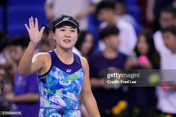 Zhu Lin of China celebrates after winning the match against Veronika Kudermetova in the women's singles 1st round match on Day 1 of the WTA Elite...