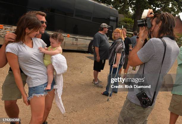 Singer/Songwriter/Photographer Jake Owen photographs his Wife/Model Lacey Buchanan, Photo Bomber GAC's Storme Warren and Daughter Pearl backstage at...