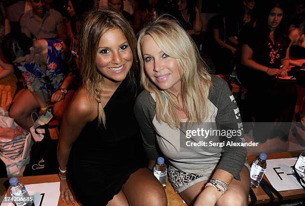 Alexa Cavalea and Karen Jensen attend the Caffe Swimwear show during Mercedes-Benz Fashion Week Swim 2014 at Oasis at the Raleigh on July 21, 2013 in...