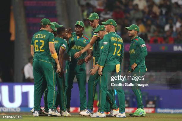 Lizaad Williams of South Africa celebrates the wicket of Bangladesh's captain Shakib Al Hasan during the ICC Men's Cricket World Cup 2023 match...