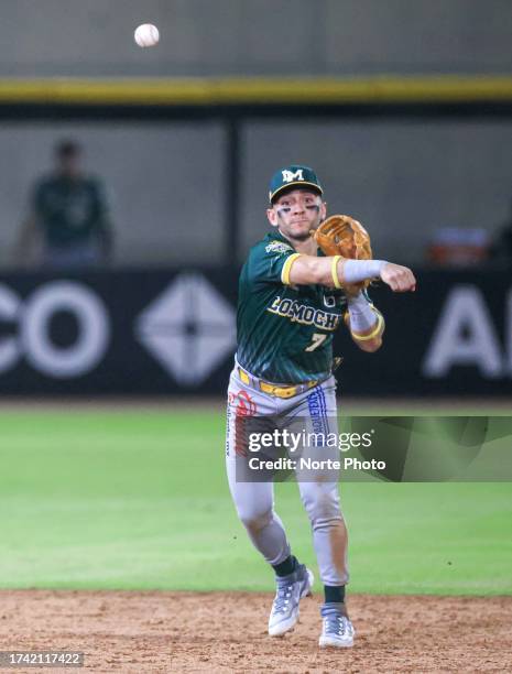 Marco Jaime de los Cañeros makes a throw to first base to get out in the fourth inning ,during a match between Naranjeros de Hermosillo and Cañeros...