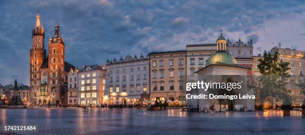 st. mary's basilica, church of st. wojciech, krakow, poland - town hall tower stock pictures, royalty-free photos & images