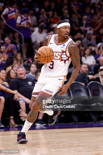 Bradley Beal of the Phoenix Suns dribbles the ball during the game against the Portland Trail Blazers at Footprint Center on October 16, 2023 in...