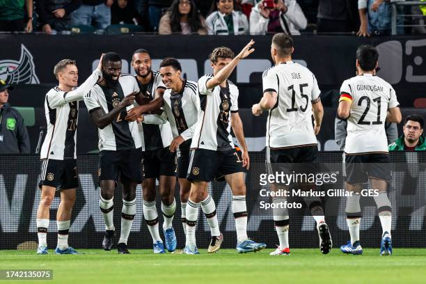 Antonio Ruediger of Germany celebrates after scoring his team's first goal with Florian Wirtz, Jonathan Tah, Jamal Musiala, Thomas Mueller, Niklas...