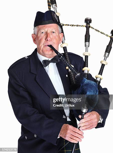 tradional scottish piper - bagpipe stockfoto's en -beelden