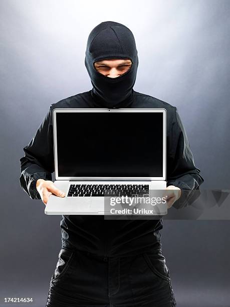 Computer Robber 3,482 Thief Portrait Stock Photos, High-Res Pictures, and Images ...