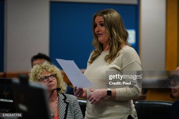 Jenna Ellis reads a statement after pleading guilty to a felony count of aiding and abetting false statements and writings, inside Fulton Superior...