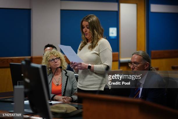 Jenna Ellis reads a statement after pleading guilty to a felony count of aiding and abetting false statements and writings, inside Fulton Superior...