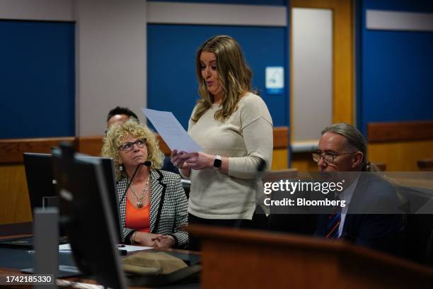 Jenna Ellis, former legal adviser to former US President Donald Trump, reads a statement at the Fulton County Courthouse in Atlanta, Georgia, US, on...