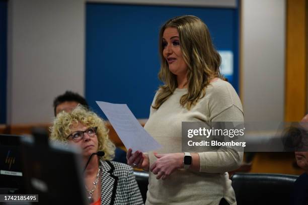 Jenna Ellis, former legal adviser to former US President Donald Trump, reads a statement at the Fulton County Courthouse in Atlanta, Georgia, US, on...