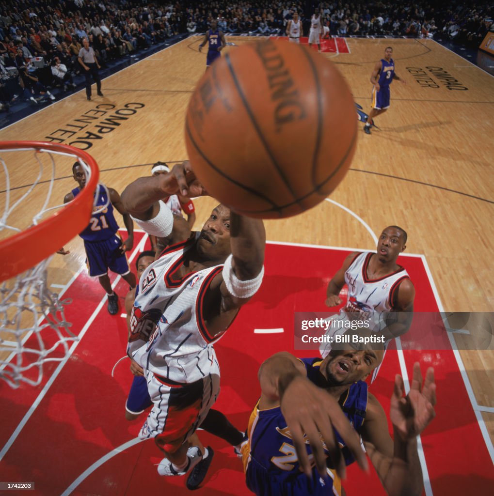 Francis Houston Rockets Steve Francis of the Houston Rockets puts a shot up over Brian Shaw ...