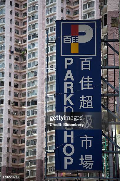 Signage is displayed outside a ParknShop supermarket, operated by Hutchison Whampoa Ltd., in Hong Kong, China, on Monday, July 22, 2013. Billionaire...