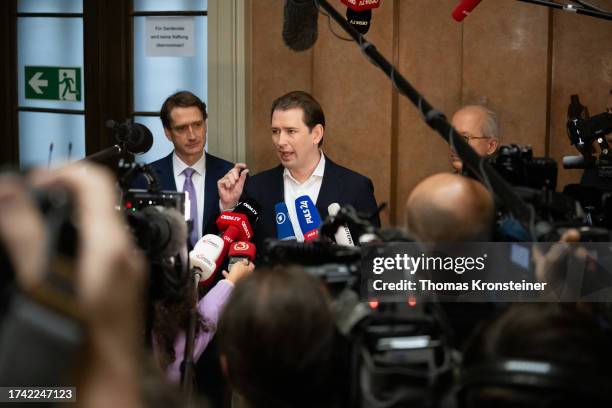 Former Austrian Chancellor Sebastian Kurz speaks to media as he arrives for the first day of his trial on October 18, 2023 in Vienna, Austria. Kurz,...