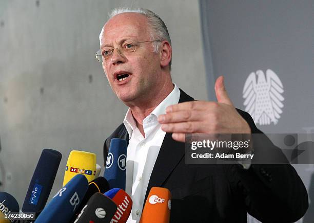 Former German Defense Minister Rudolf Scharping speaks to the press after attending a panel of the first parliamentary inquiry witness hearing into...