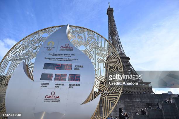 Paris 2024 Olympic Games countdown timer is seen in front of Eiffel Tower in Paris, France on October 21, 2023.