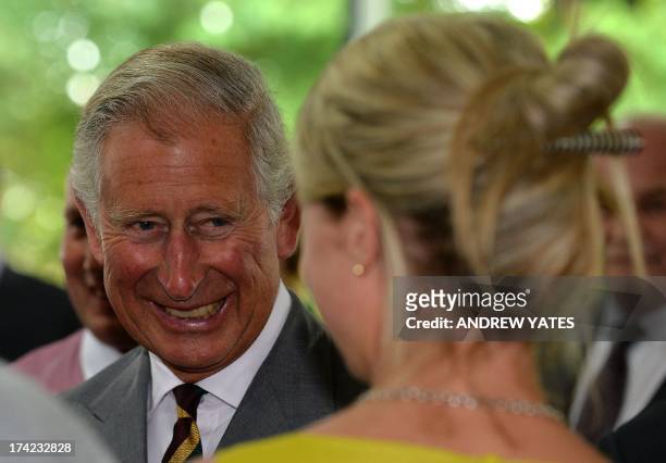 Britain's Prince Charles, Prince of Wales arrives at Dovecote Park in Pontefract, West Yorkshire on July 22, 2013. Prince William's wife Kate was...