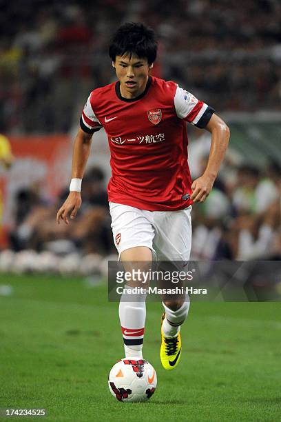 Ryo Miyaichi of Arsenal in action during the pre-season friendly match between Nagoya Grampus and Arsenal at Toyota Stadium on July 22, 2013 in...