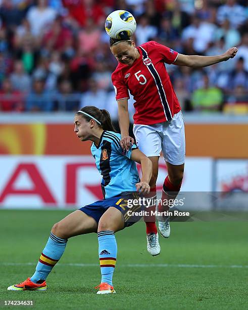 Toril Akerhaugen of Norway and Alexia Putellas of Spain battle for the ball during the UEFA Women's Euro 2013 quarter final match between Norway and...