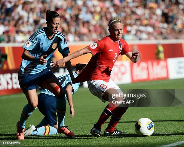 Norway's midfielder Solveig Gulbrandsen vies for the ball with Spain's midfielder Jennifer Hermoso during the UEFA Women's European Championships...