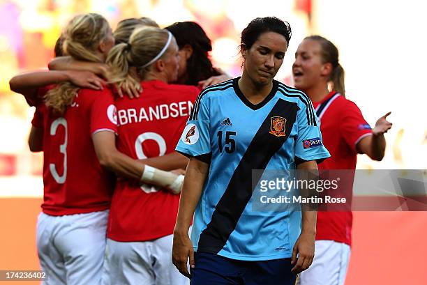Silvia Meseguer of Spain reacts as Norway celebrate their second goal during the UEFA Women's Euro 2013 quarter final match between Norway and Spain...