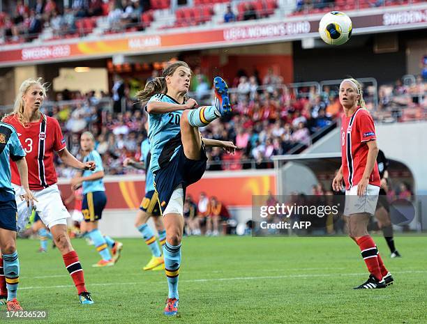 Spain's defender Irene Paredes kicks the ball to an own goal during the UEFA Women's European Championships Euro 2013 quarter- final match between...