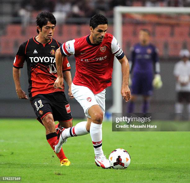 Mikel Arteta of Arsenal in action during the pre-season friendly match between Nagoya Grampus and Arsenal at Toyota Stadium on July 22, 2013 in...