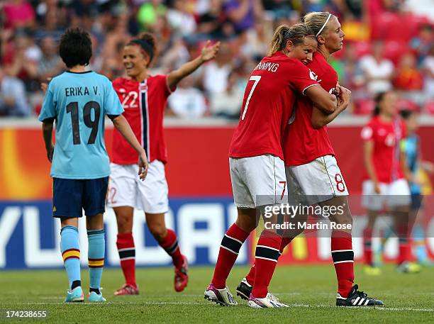 Trine Roenning of Norway celebrate with team mate Solveig Gulbrandsen after the UEFA Women's Euro 2013 quarter final match between Norway and Spain...