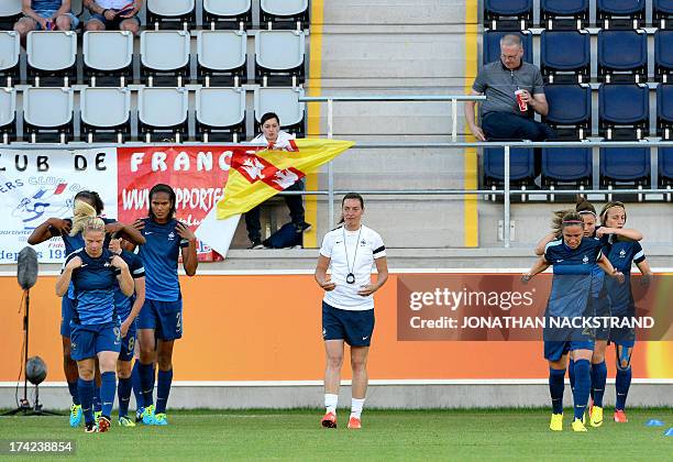 France's players warm up prior to the UEFA Women's European Championship Euro 2013 quarter final football match France vs Denmark on July 22, 2013 in...