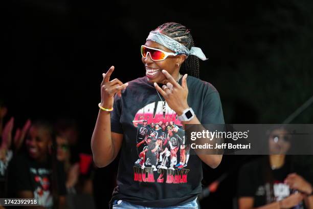 Chelsea Gray of the Las Vegas Aces celebrates during the 2023 WNBA championship victory parade and rally on the Las Vegas Strip on October 23, 2023...